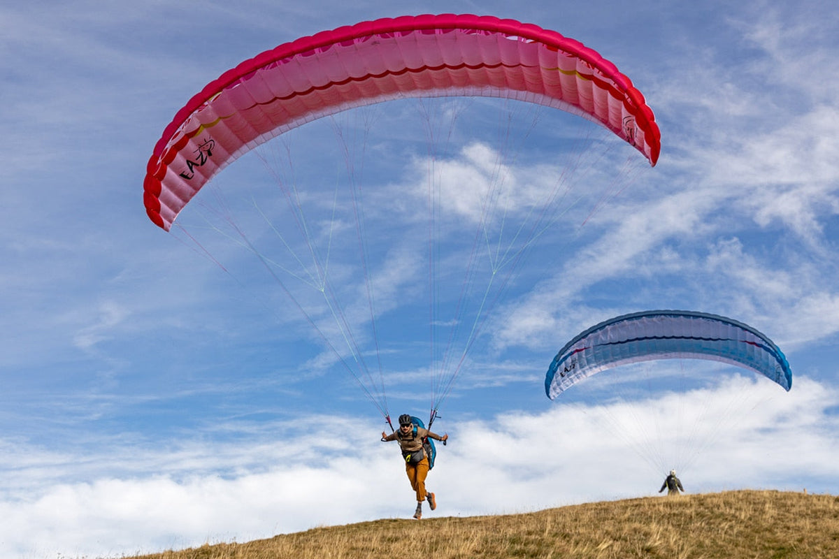 Experienced paraglider pilot progressing towards a PG5 rating in Australia